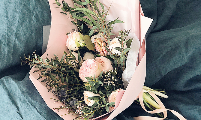 Custom wrapped flower arrangement